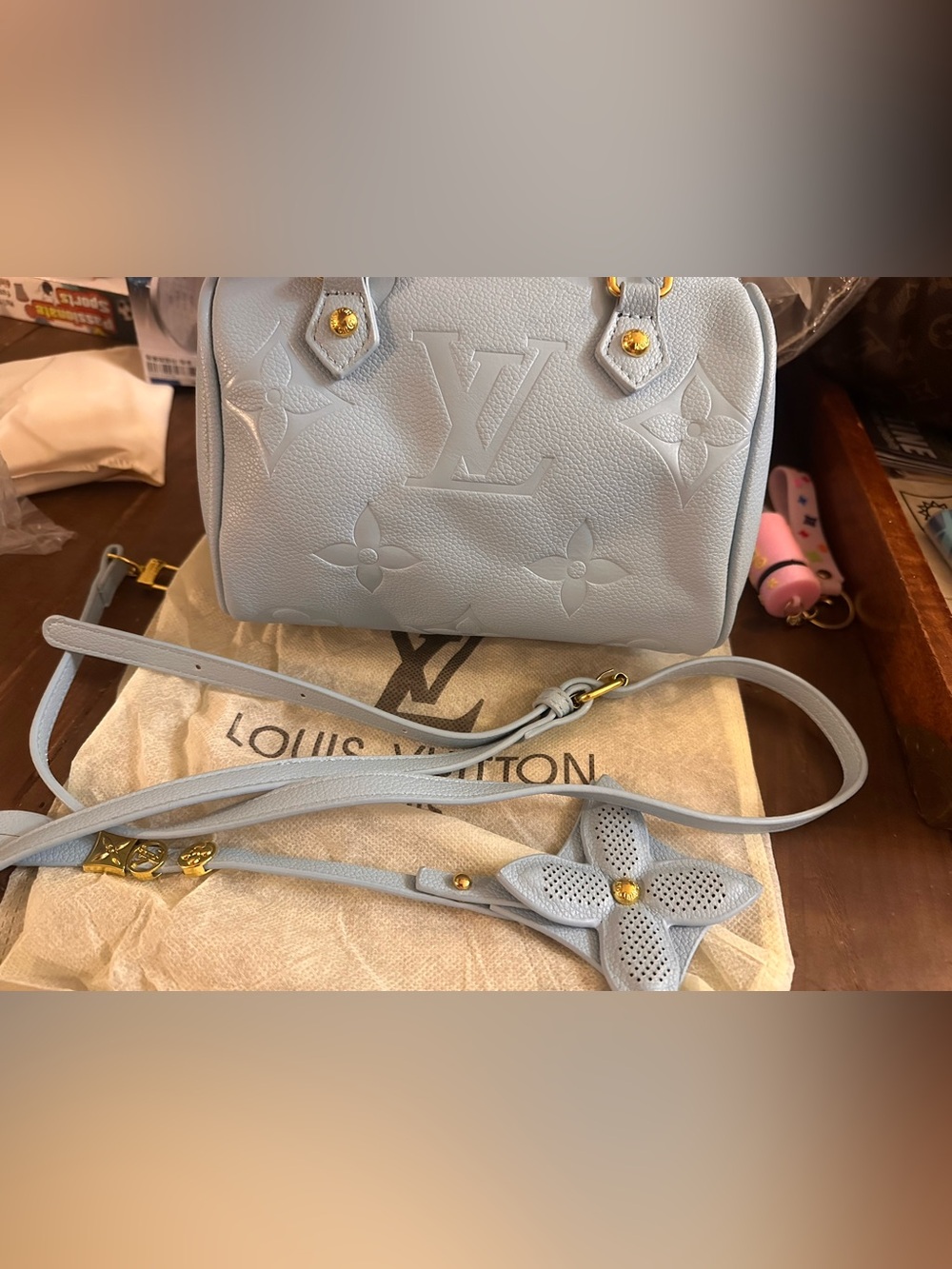 Light Blue Embossed Monogram Crossbody Bag
